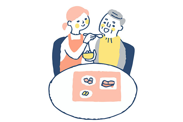 食事の介助をされているおじいちゃん